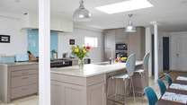 The kitchen has all the modern appliances needed to make a delicious meal at home.