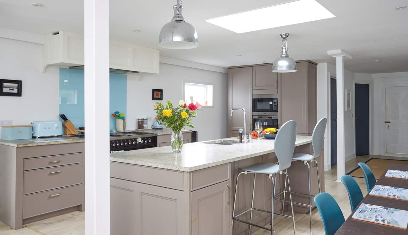 The kitchen has all the modern appliances needed to make a delicious meal at home.