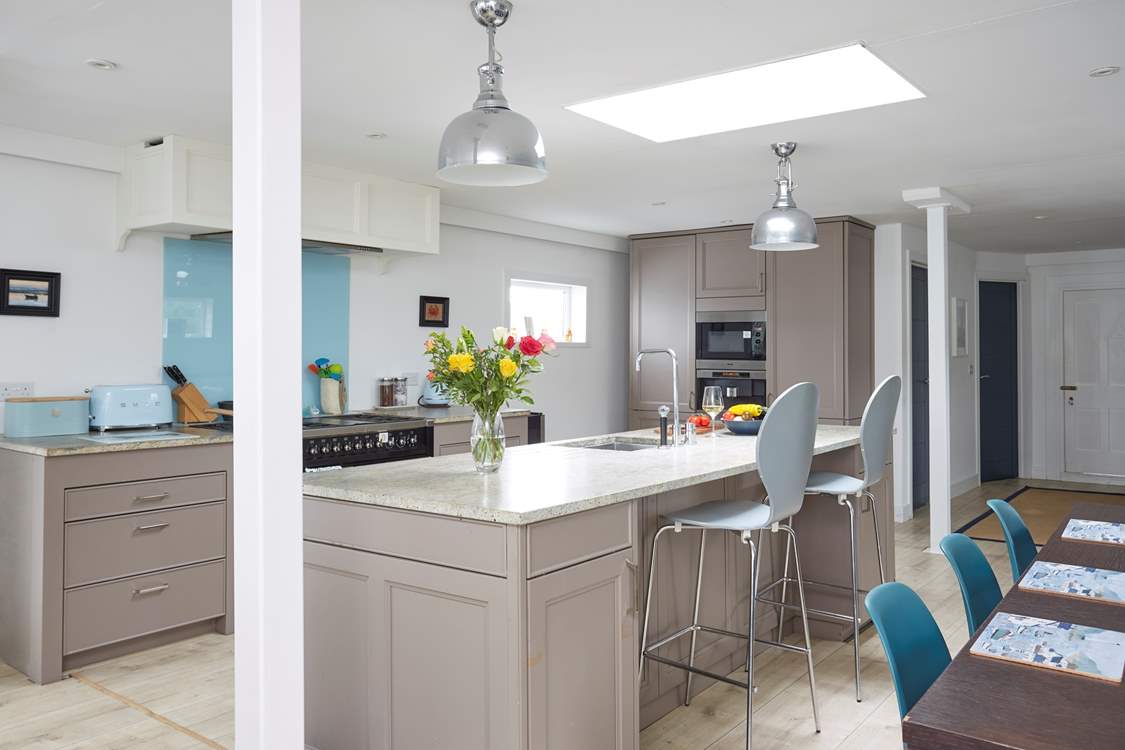 The kitchen has all the modern appliances needed to make a delicious meal at home.