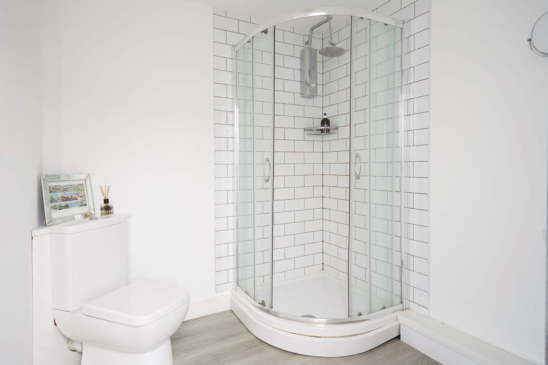 Both bedroom 2 and 3 access the shared shower-room.