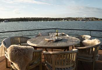 Enjoy al fresco dining any time on board your luxury houseboat.
