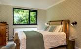 Calming green tones can be found in bedroom 3. - Thumbnail Image