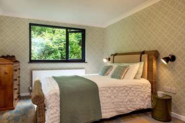 Calming green tones can be found in this bedroom (Bedroom 3).