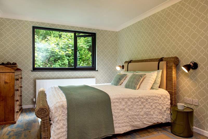 Calming green tones can be found in this bedroom (Bedroom 3).