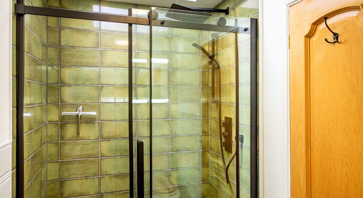 Enjoy a soak under the rainfall shower.