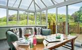 The conservatory links the kitchen/diner with the outside space. - Thumbnail Image