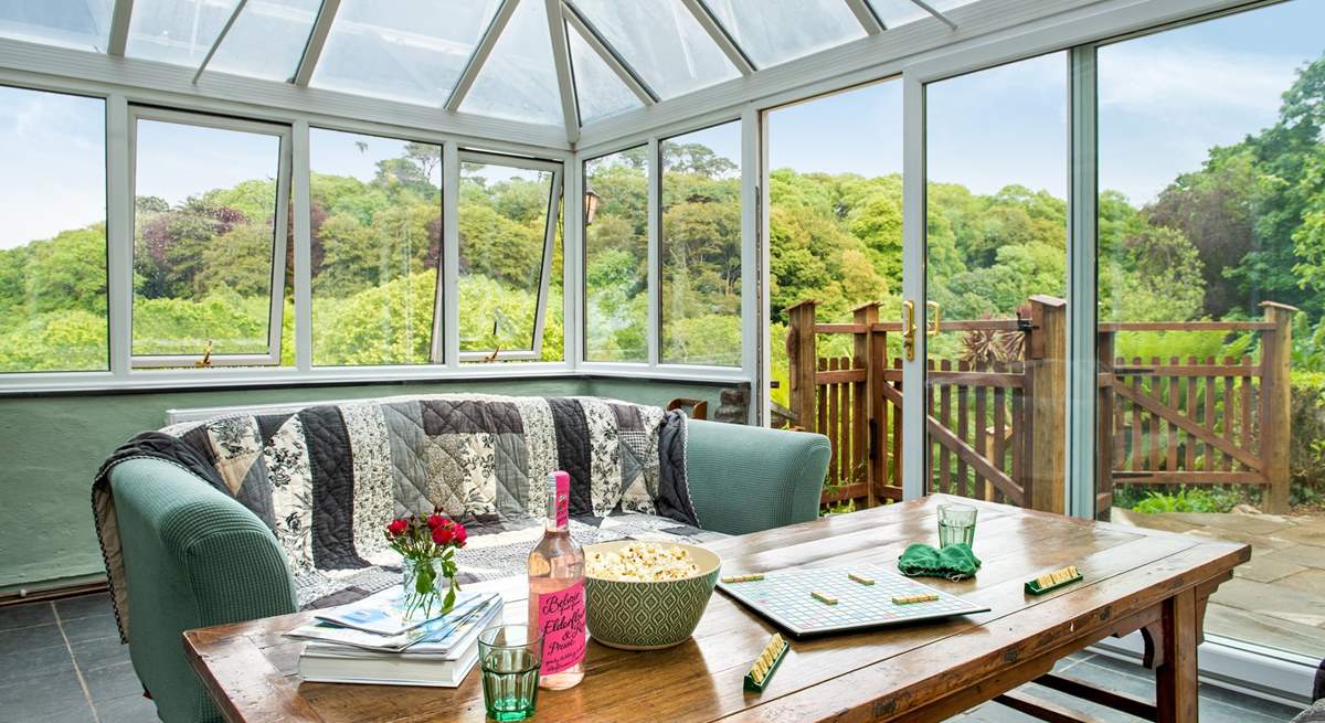 The conservatory links the kitchen/diner with the outside space.