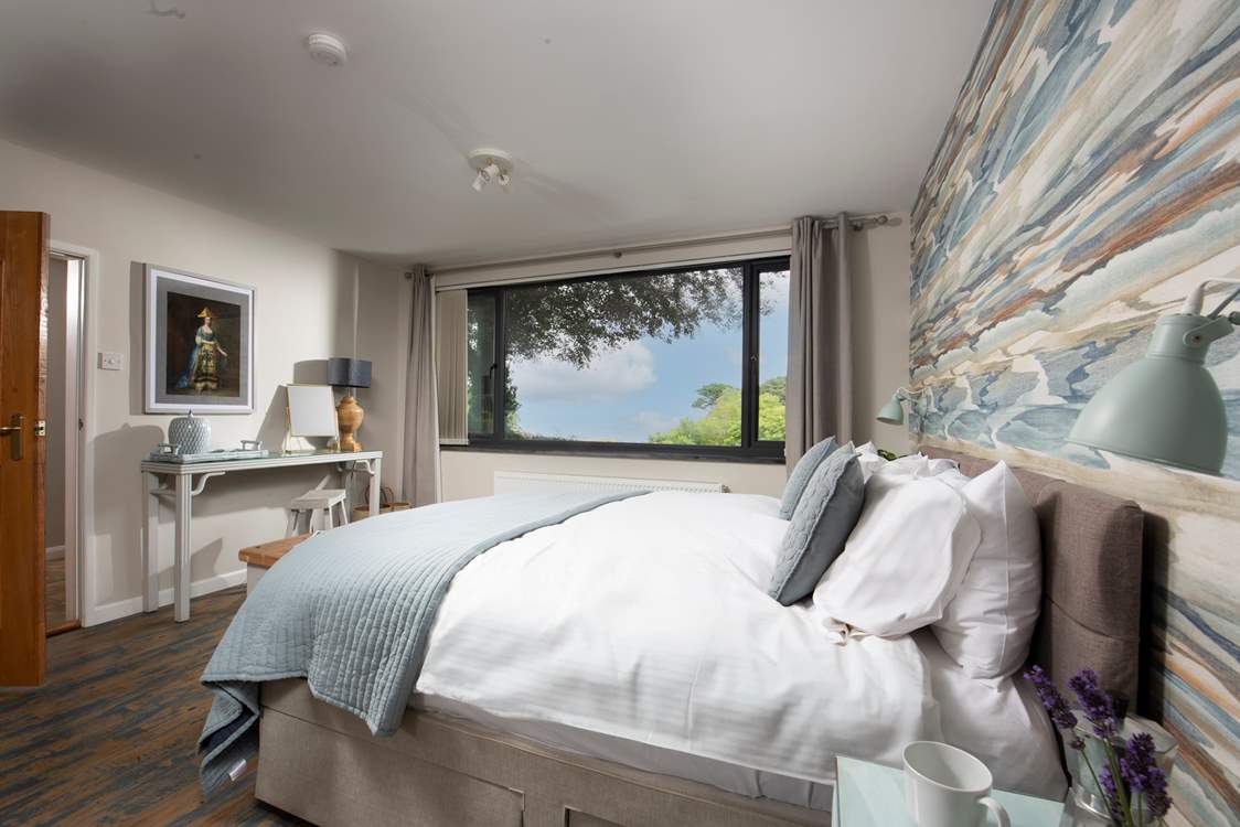 The fabulous main bedroom with stunning views.
