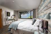 The fabulous main bedroom with stunning views.