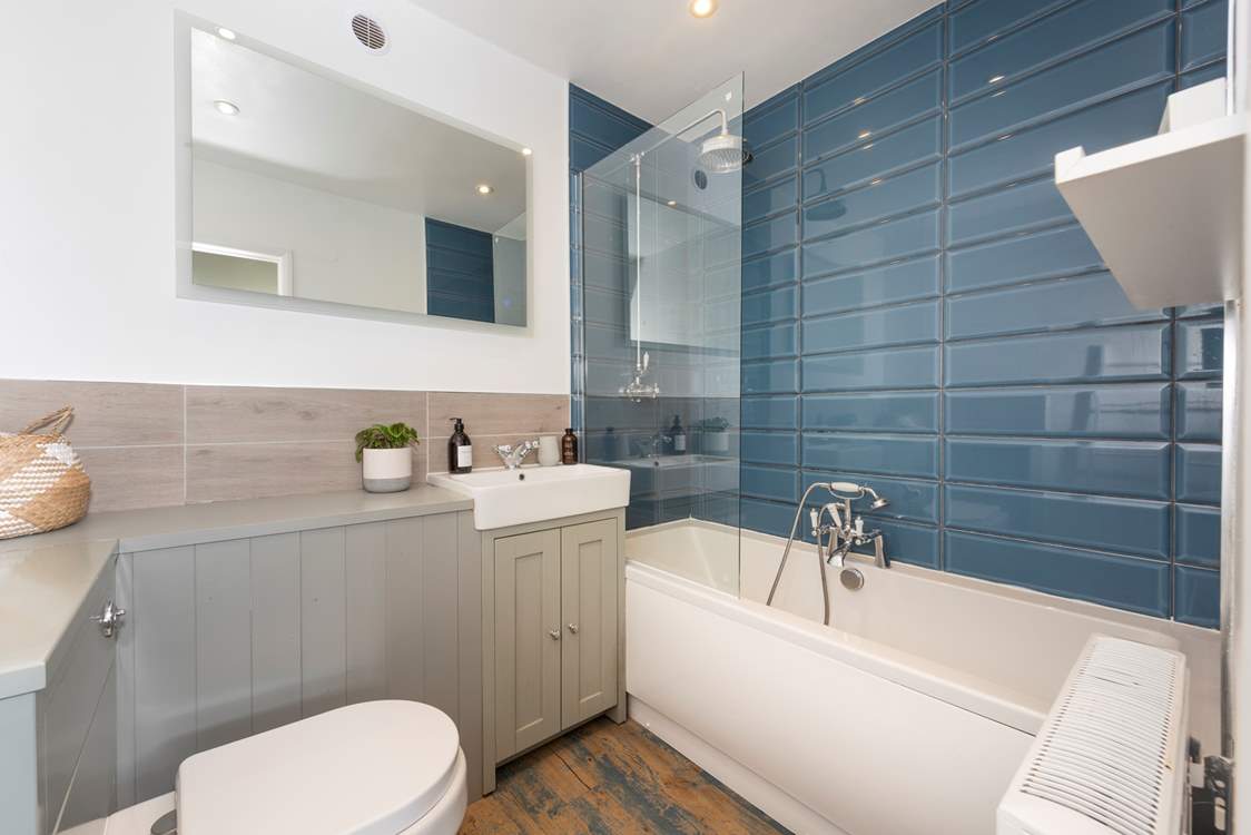 Soak the day away in the beautifully presented ensuite bathroom in bedroom 1.