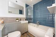 Soak the day away in the beautifully presented ensuite bathroom in bedroom 1.