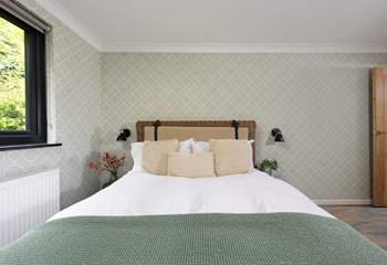 Sink into the indulgent comfort of the king size bed.