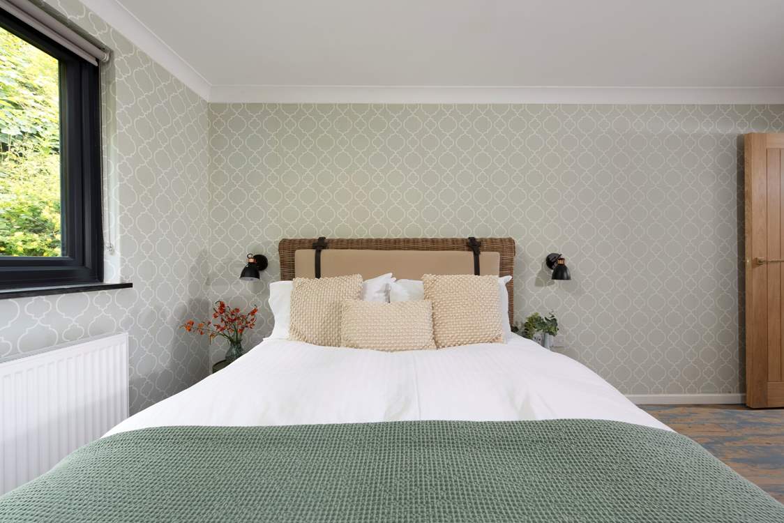 Sink into the indulgent comfort of the king size bed.
