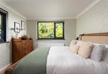 Calming green tones can be found in bedroom 3.