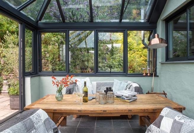 The conservatory leads to the decking in the garden.