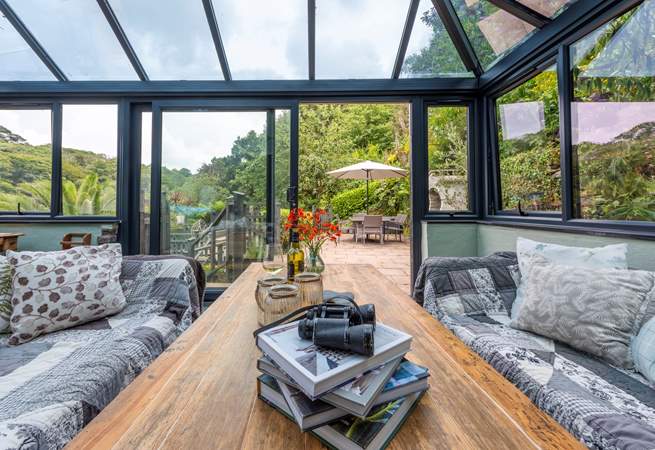 The conservatory links the kitchen/diner with the outside space.