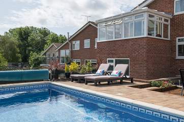 Relax on the comfortable loungers while watching the little ones splash about.