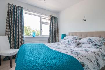 Second floor double bedroom with views out to sea.