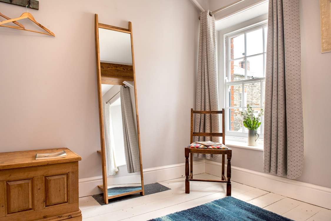 Painted wooden floors, sash windows and a wonderful mix of furniture is on offer in this gorgeous cottage.
