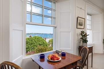 Enjoy your morning coffee watching the sun rise over the harbour.
