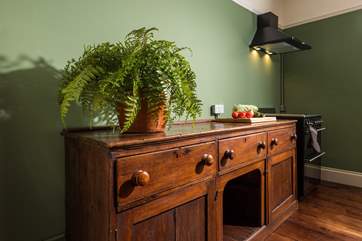 The apartment is filled with stunning furniture.