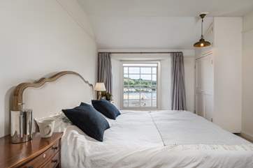 Lie in bed and watch the boats pass you by (Bedroom 3).