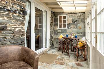 The sun-room leads out onto the terrace.