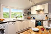 The kitchen/breakfast-room is a lovely room, well-equipped for all your holiday catering needs.