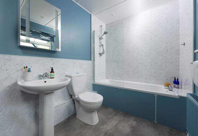 The bathroom leads off from the kitchen/dining-room.