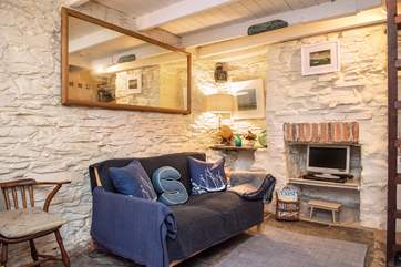 The open plan living-room is full of character.