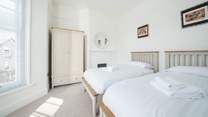 The lovely light twin bedroom.
