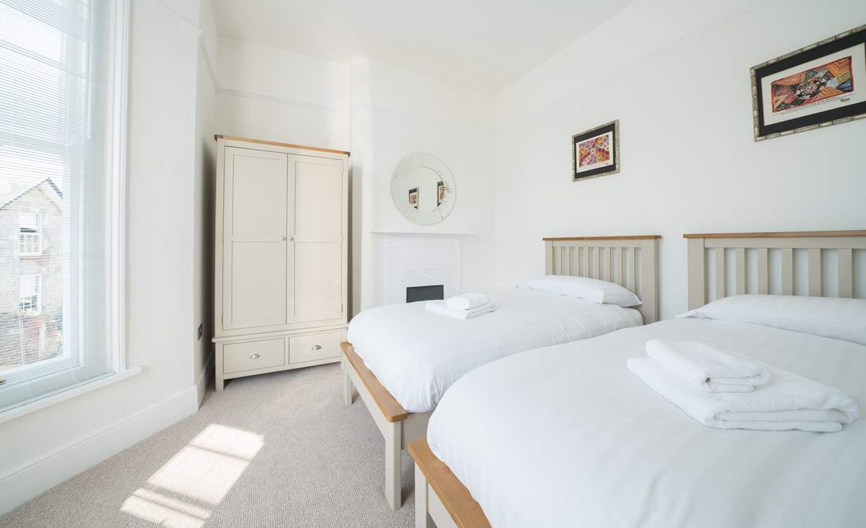 The lovely light twin bedroom.