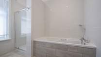 The family bathroom has a bath as well as a shower. Which to choose?