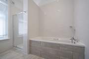 The family bathroom has a bath as well as a shower. Which to choose?
