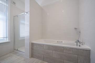 The family bathroom with shower attachment plus walk-in shower. Which to choose?