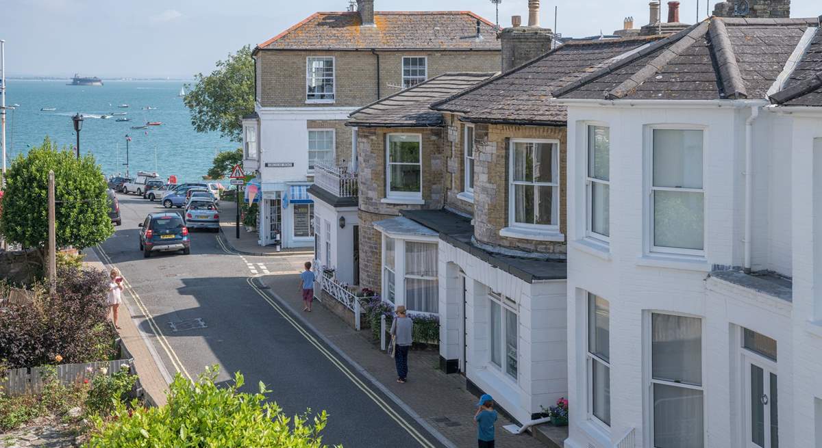 Watch the world go by from the bay window of the living-room.