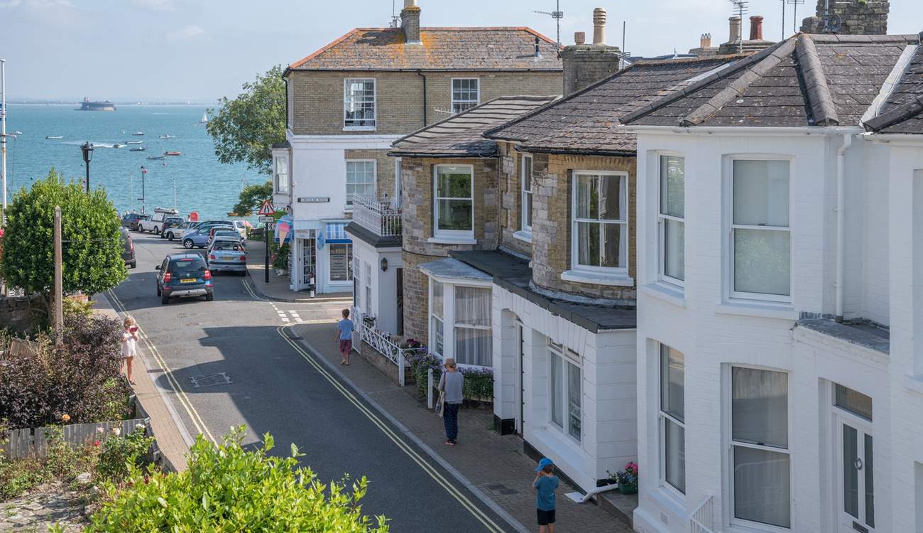 Watch the world go by from the bay window of the living-room.