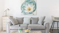 Take time out and relax on the sofa.