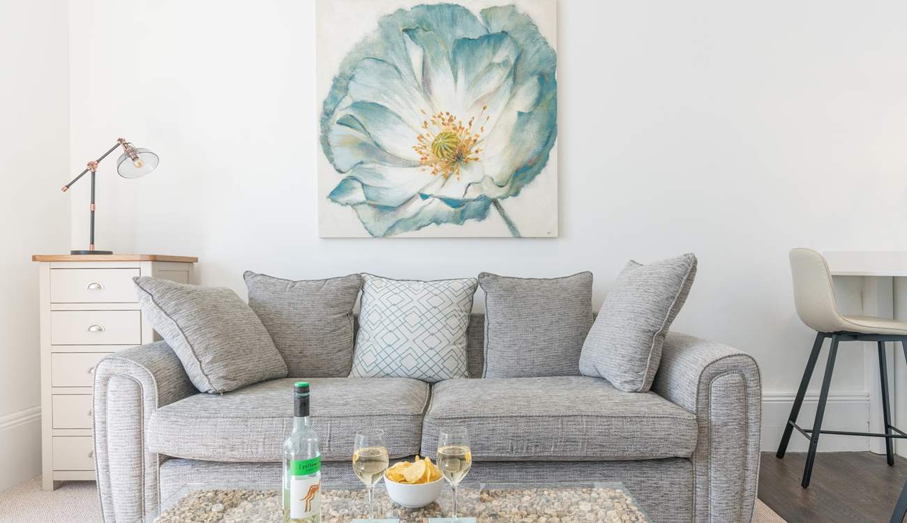 Take time out and relax on the sofa.