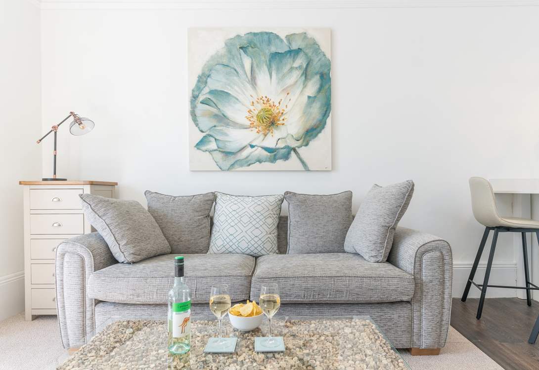 Take time out and relax on the sofa.