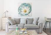 Take time out and relax on the sofa.