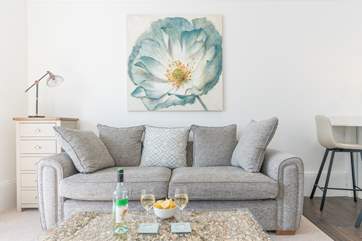 Take time out and relax on the sofa.