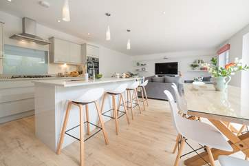Stunning open plan living-room with kitchen and dining-area.