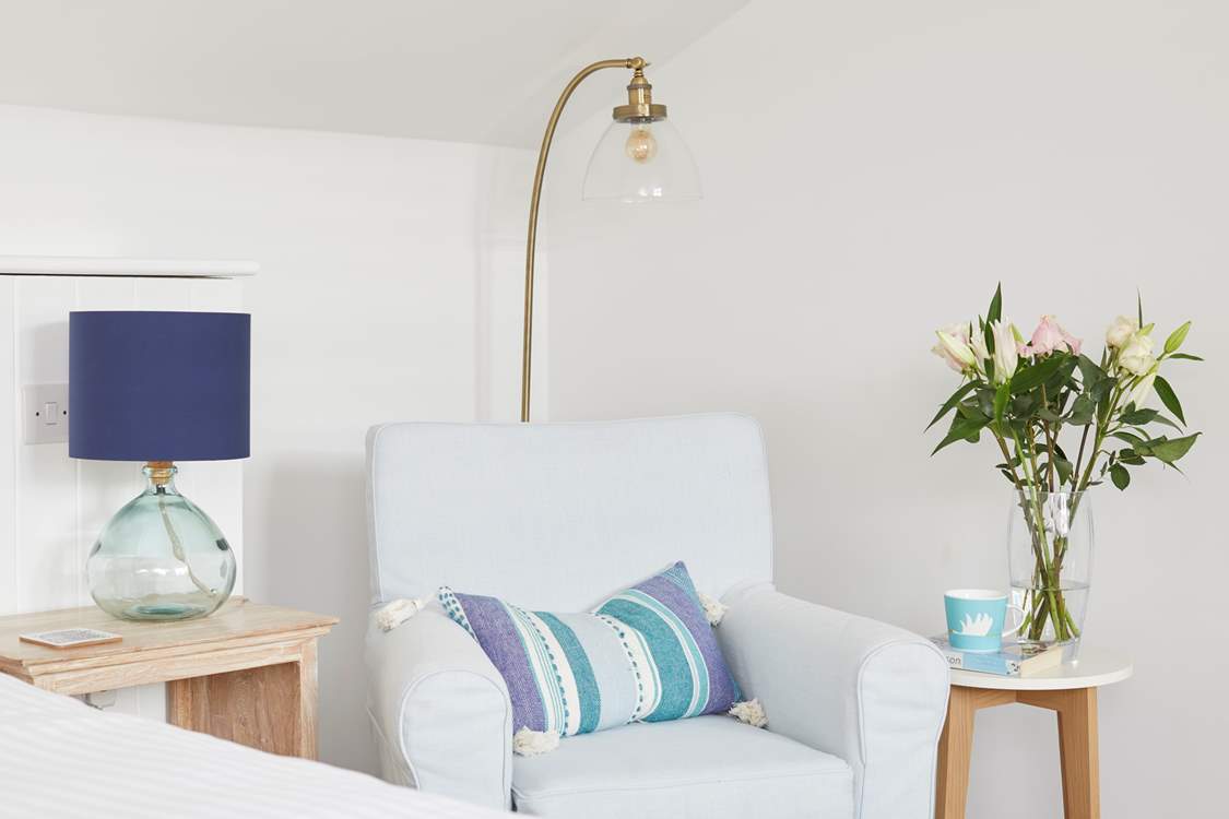 Corner seat in the main bedroom. Perfect spot for a good read.