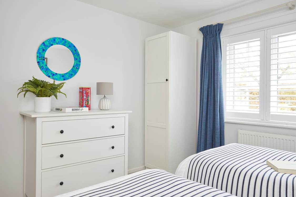 Another spacious bedroom with twin beds.  There is plenty of room for the extended family!