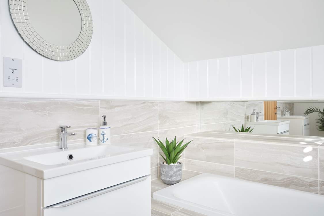 The main bedroom with en suite bathroom.