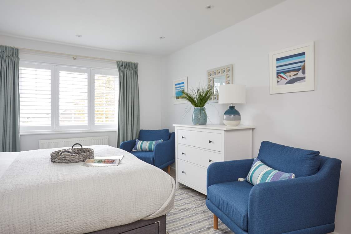 Comfortable chairs as well as the flexibility of making the bed into two singles.