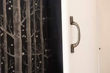 Who knows where the wardrobe (located behind the bed) will take you...