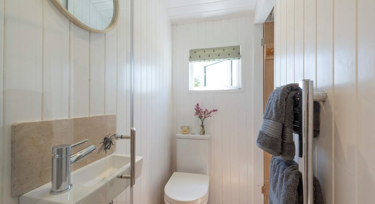 The shower-room is light, bright and stylish.