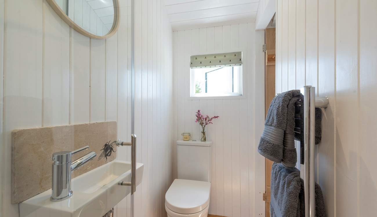 The shower-room is light, bright and stylish.